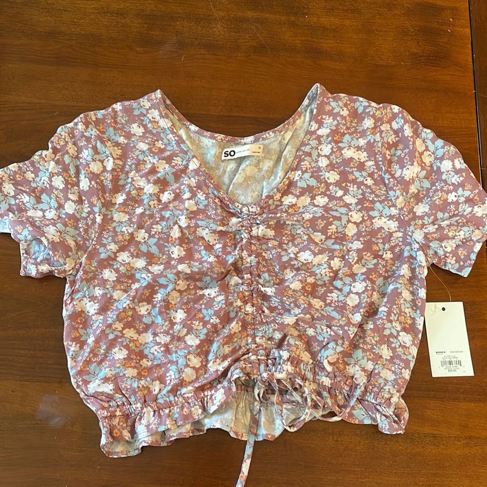 So Short Sleeve tie bottom crop top. New with tags.